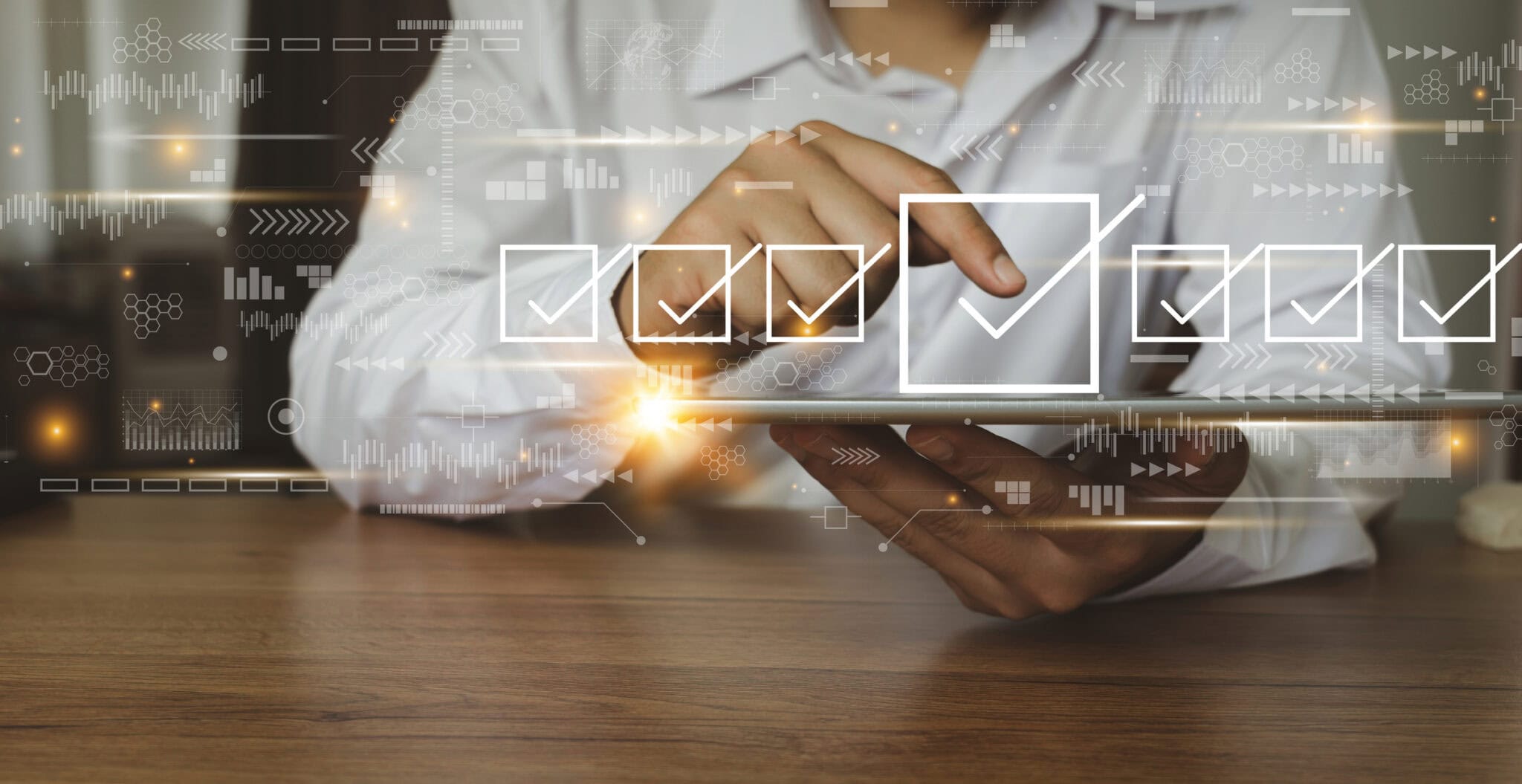 Person using tablet with digital checkboxes for business tech solutions.