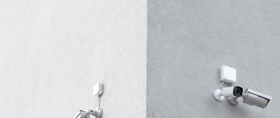 Outdoor security cameras installed on building exterior in Jacksonville, FL.