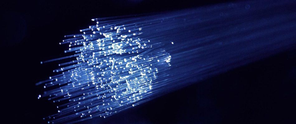 High-speed fiber optic cables transmitting data in Jacksonville, Florida.
